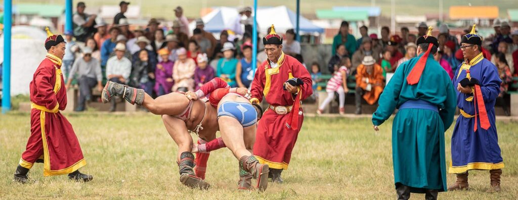 Nomadic expeditions - Classic Mongolia – Naadam Festival - Wrestlers competing