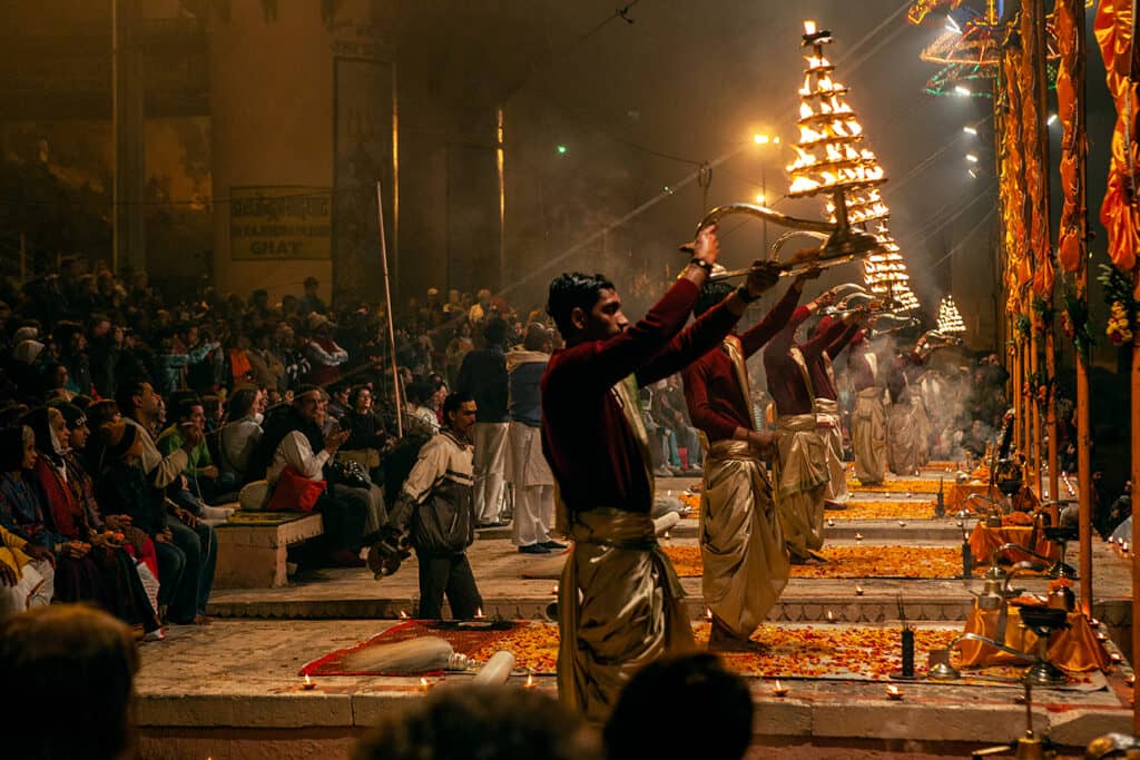 Priests performing the daily evening ‘Aarti’ (prayer ceremony) on the Ghats of Varanasi